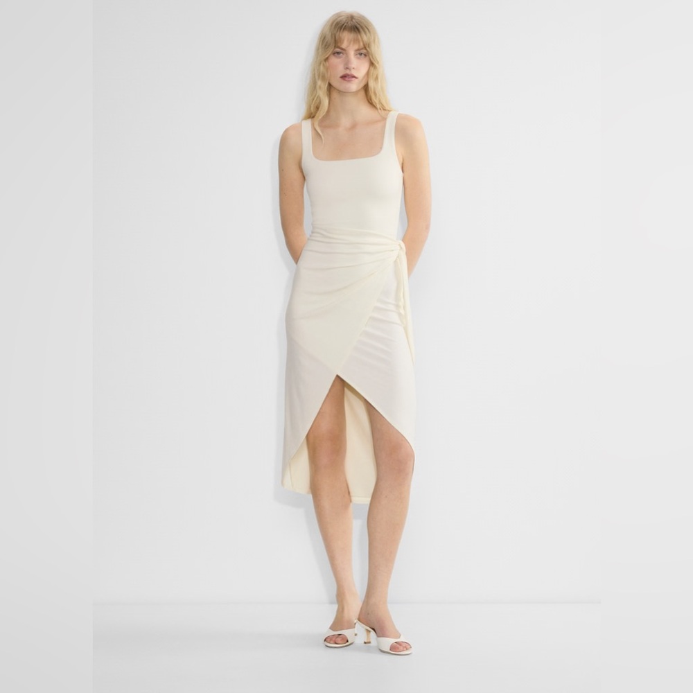 Saturn Midi Dress
Drapey midi resort wrap dress